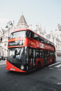 red double decker hop on hop off bus in london