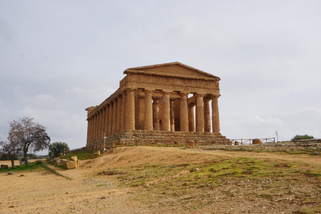 Photo of well-preserved ruins of a Roman temple at the Valley of the Temples in Agrigento, Sicily.