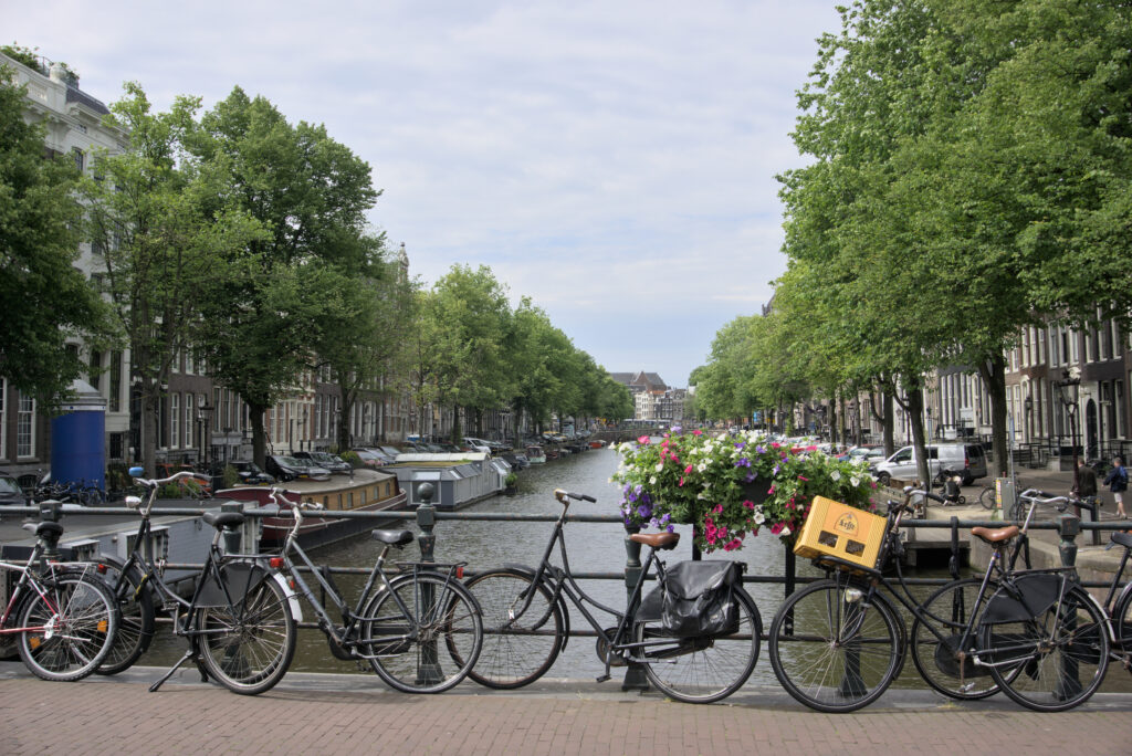 Bikes parked along the canal as seen on our 4 days in Amsterdam with kids.