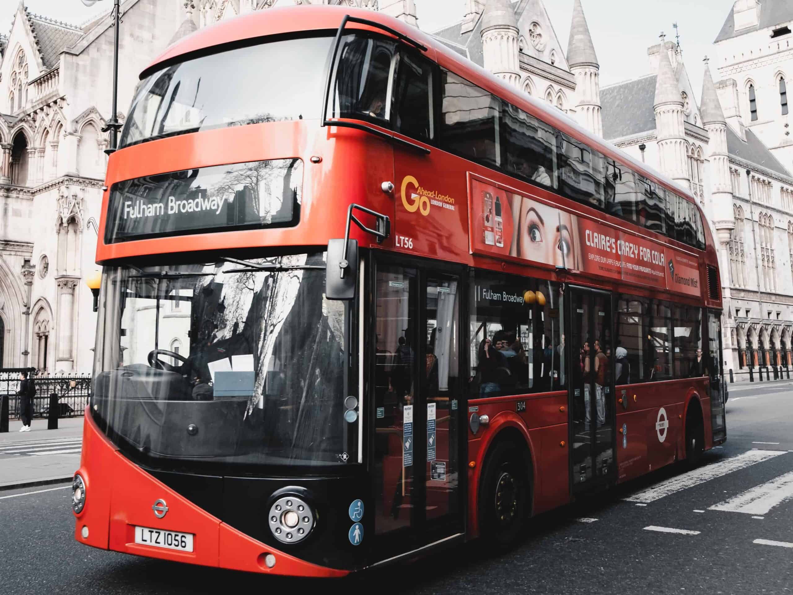 red double decker hop on hop off bus in london