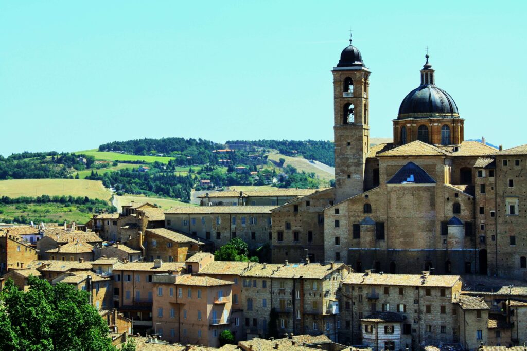 cathedral building along the Tuscan countryside.