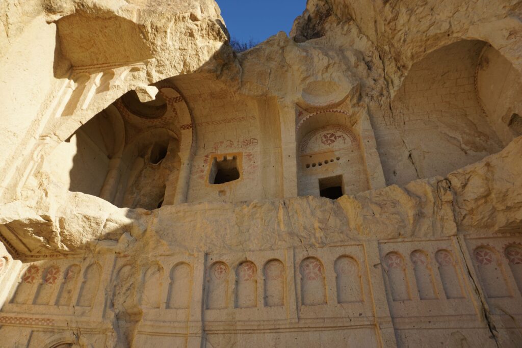 stone church at the goreme open air museum in cappadocia, turkiye.