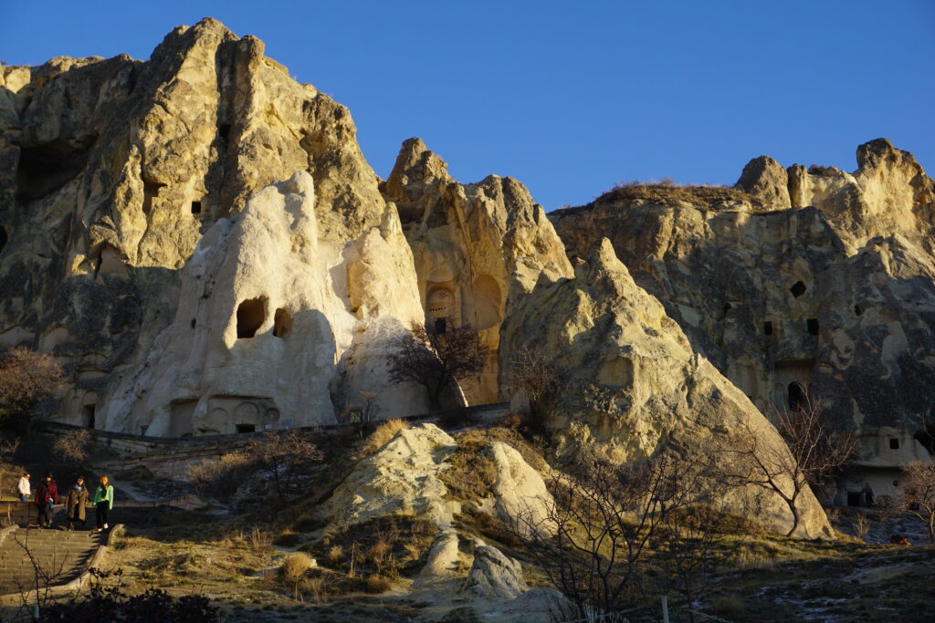 dwellings carved into rock formations at the goreme open air museum in Cappadocia, Turkey