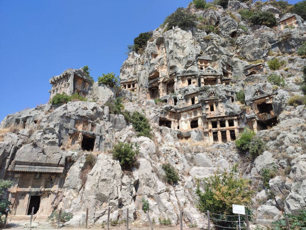 Ancient ruins built into a mountainside.