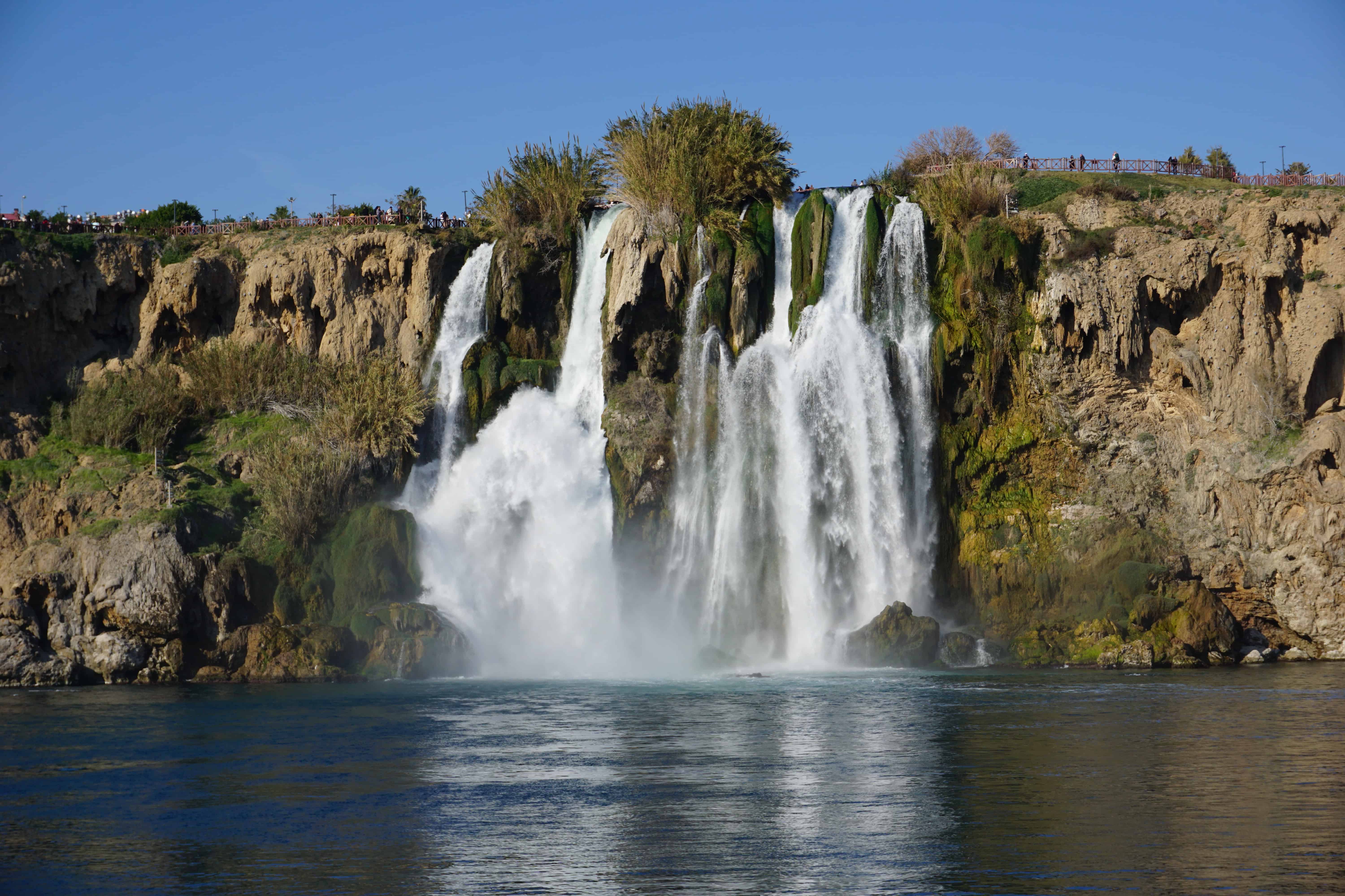 waterfalls cascading directly into the Mediterranean Sea.