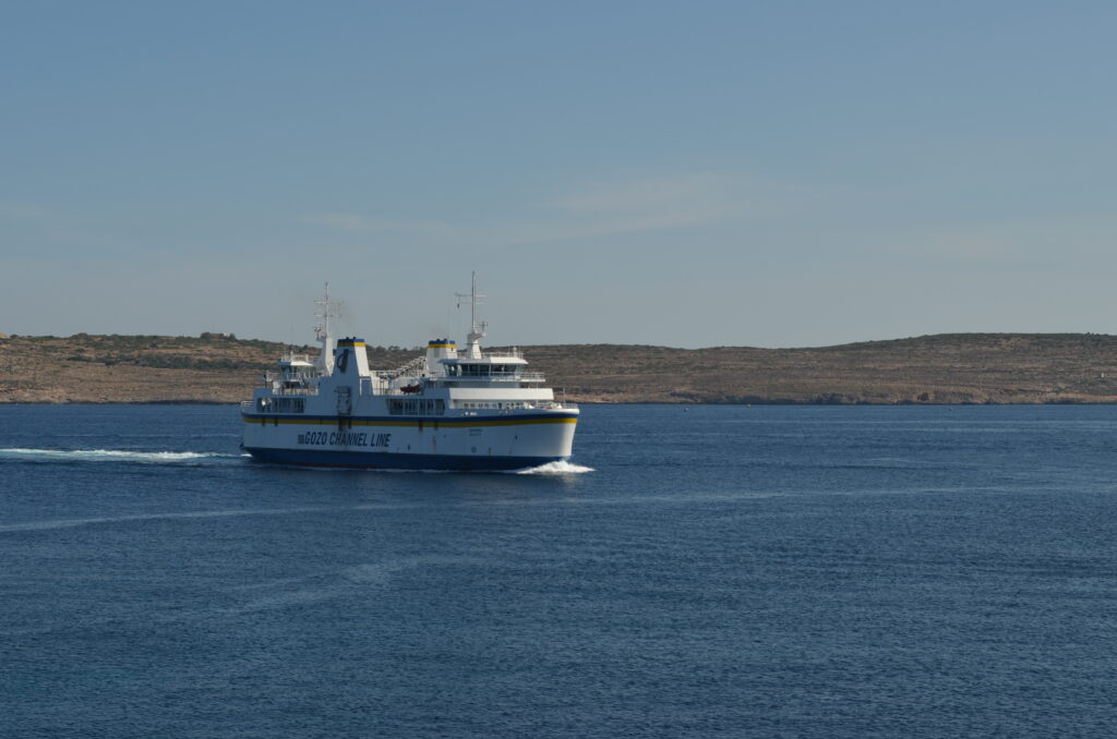 white ferry travelling to Malta.