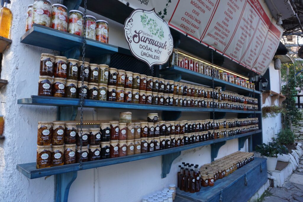 jars of preserves, including Pomegranate Molasses on sale at a Turkish souvenir shop.