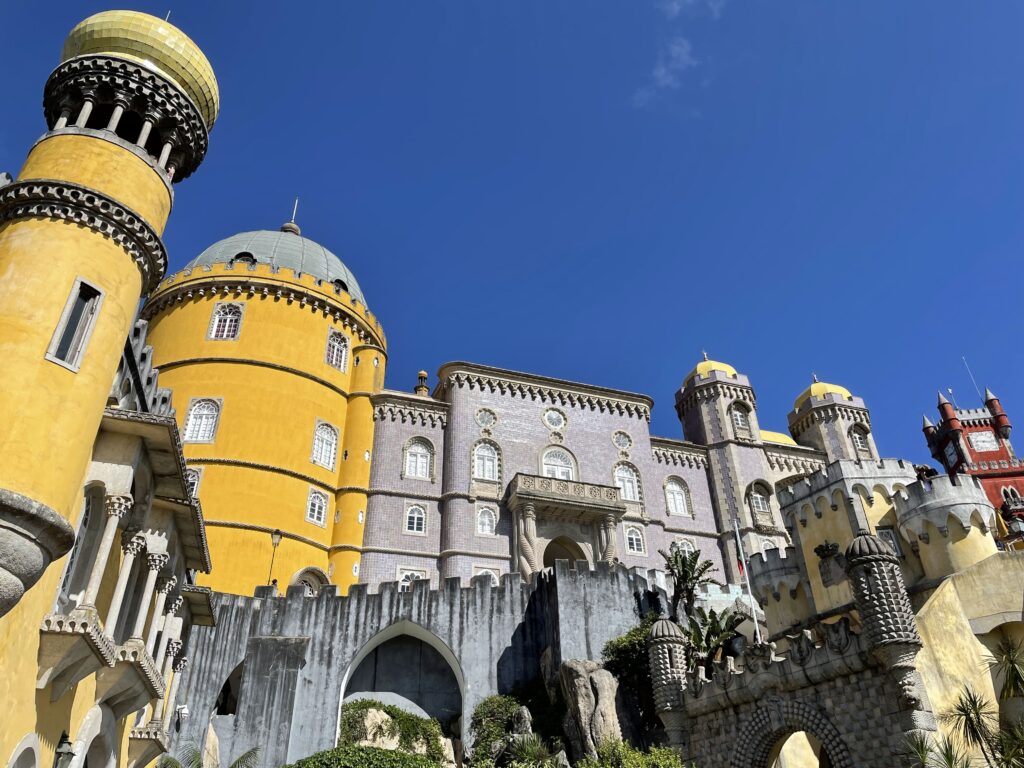 The colorful yellow and red facade of Portugal's Pena Palace.